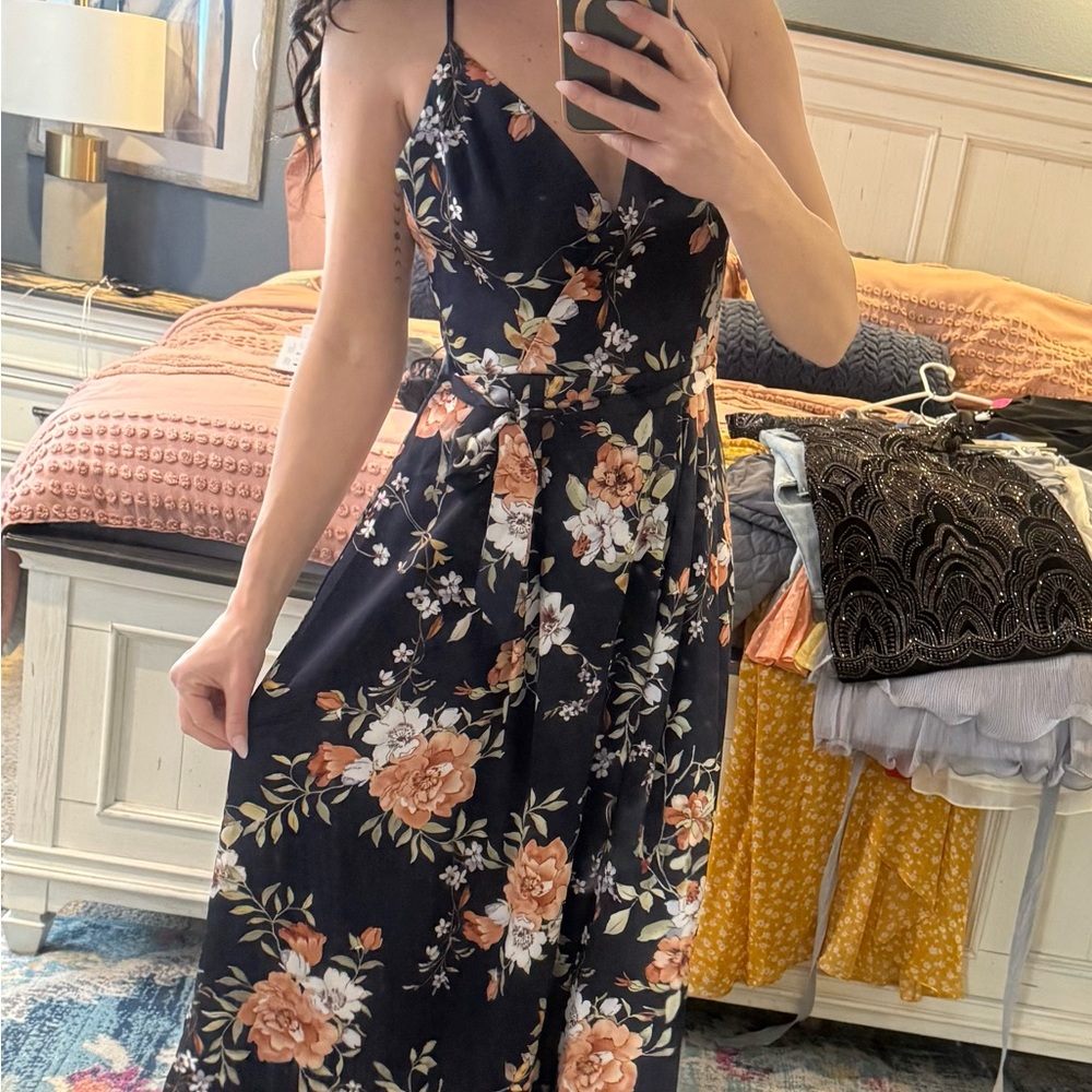 Magnolia Boutique, spaghetti, cross back tie waist navy and floral maxi dress.